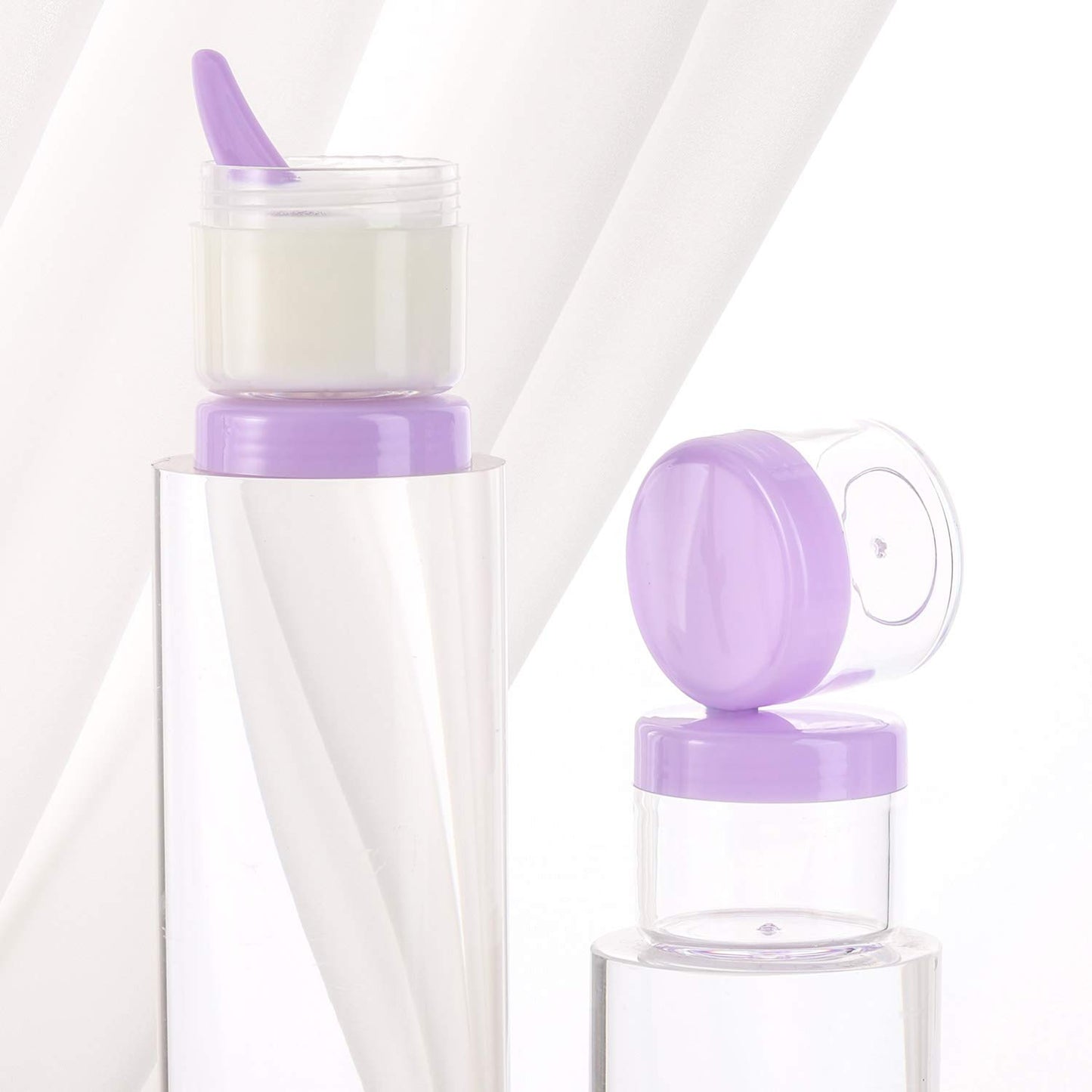 Refillable Cosmetic Sample Jars - 100 Pack 20g (0.7oz) Purple Small Travel Containers with Lids + 10 Mini Makeup Spatulas - BPA Free